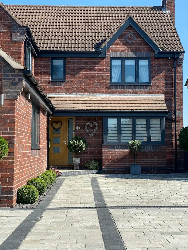 Brick paver driveway in a herringbone pattern